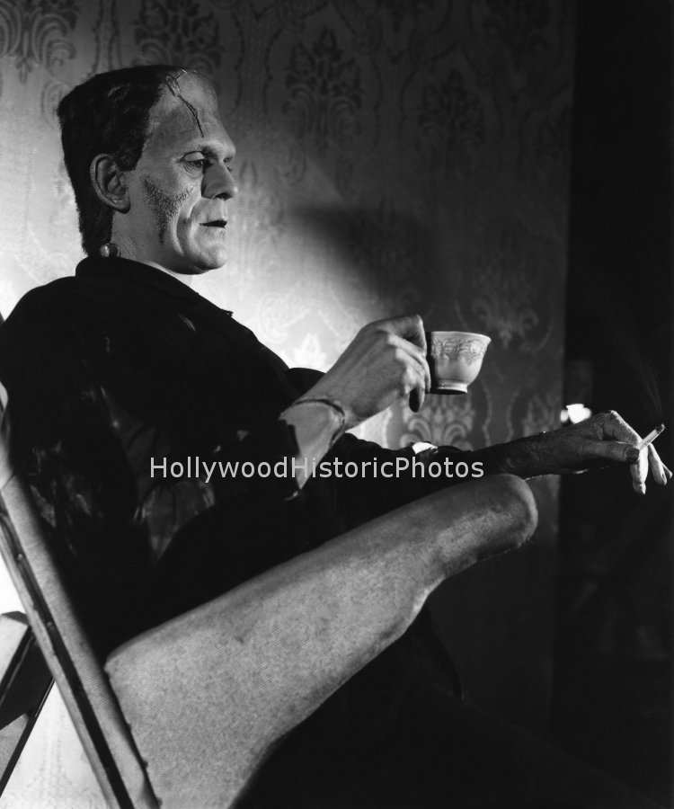 Boris Karloff 1935 Bride of Frankenstein taking a break and having a cup of tea and a cigarette on his leaning board.jpg